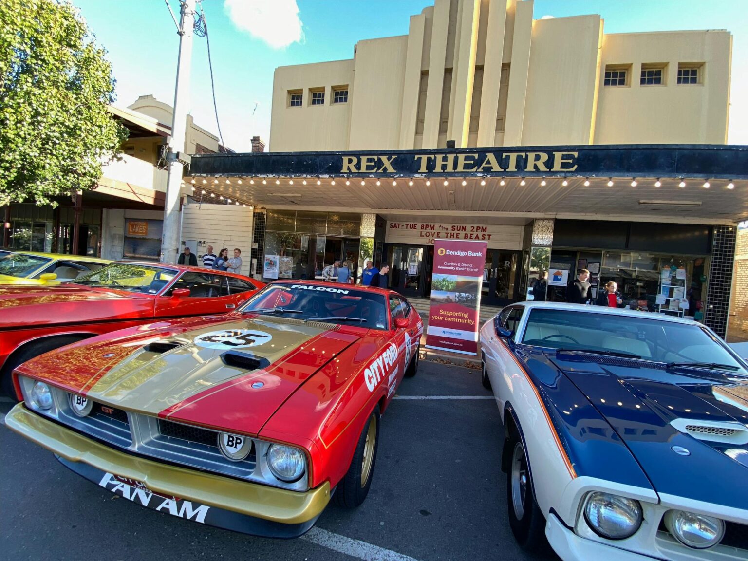 Restored Ford coupes make a stunning show in front of The Rex