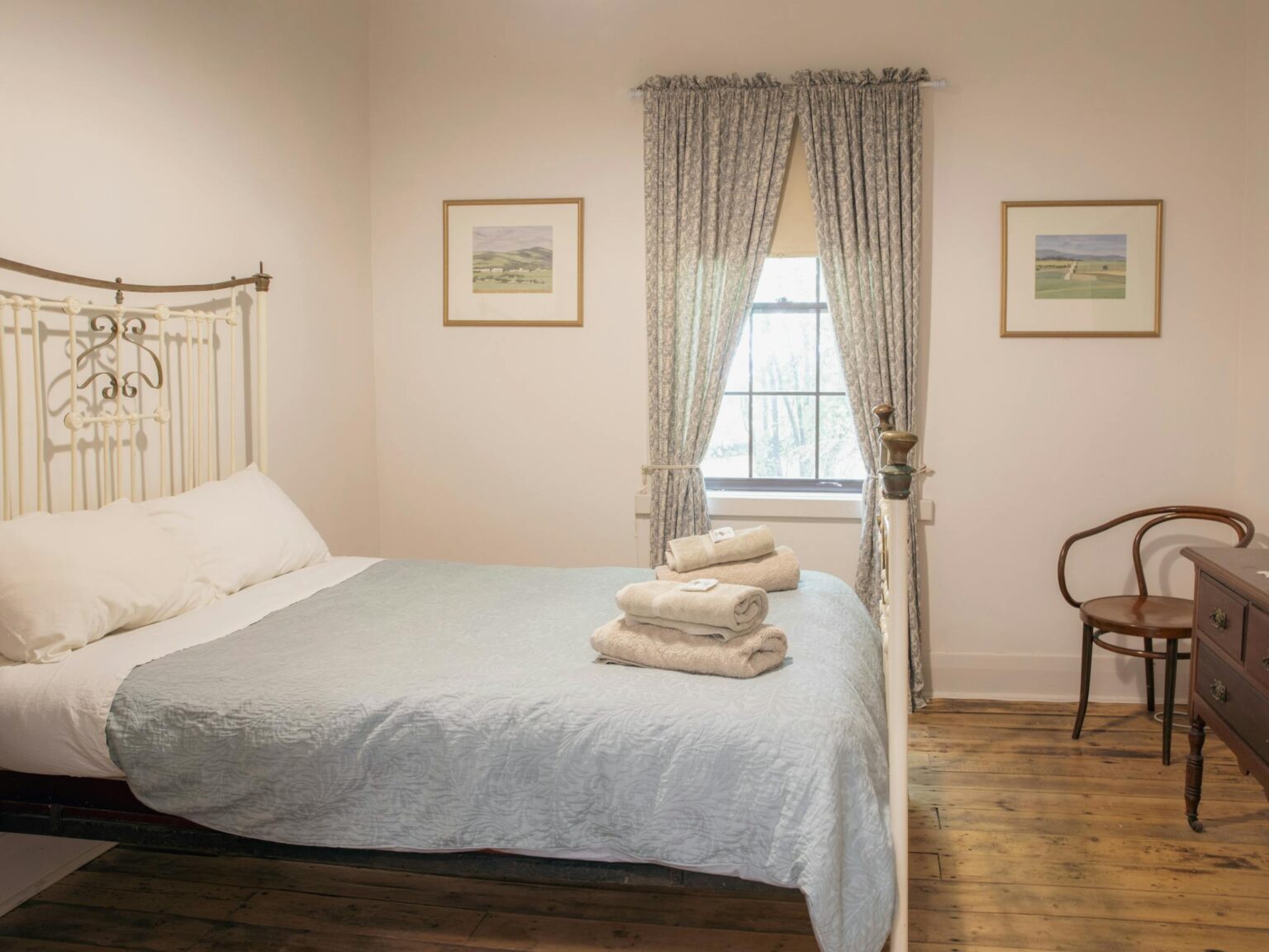 Old fashioned brass bed in a old style hotel room