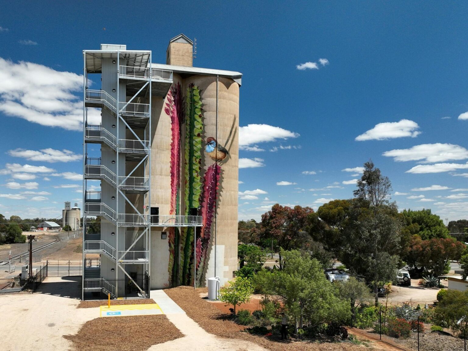 Painted silo with lookout tower alongside