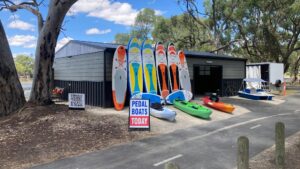 The boat house with water equipment at the front