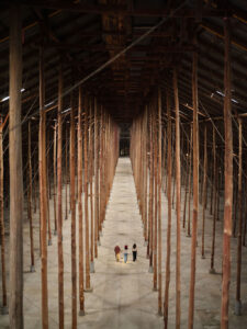 An aerial image of three people in the Stick Shed (Events venue) in the Wimmera Mallee