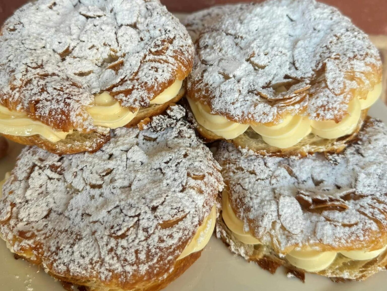 Photo of cakes full of cream known as Bee-sants