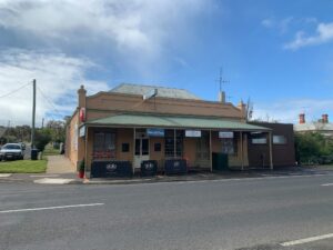 Shop front with outdoor eating area.
