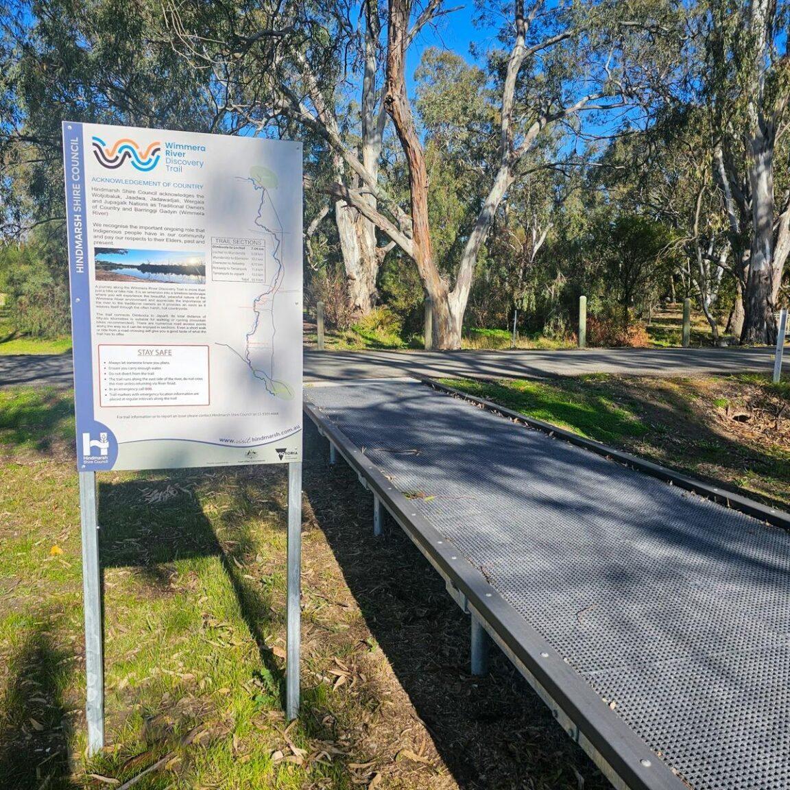 boardwalk with trail sign