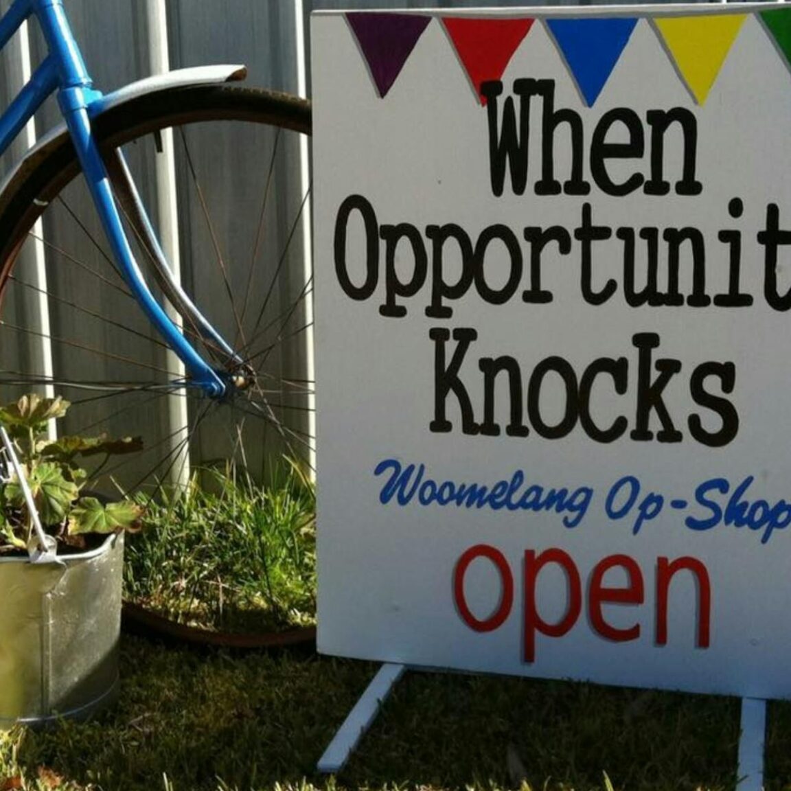 Sign out front of 'open' Woomelang Op Shop