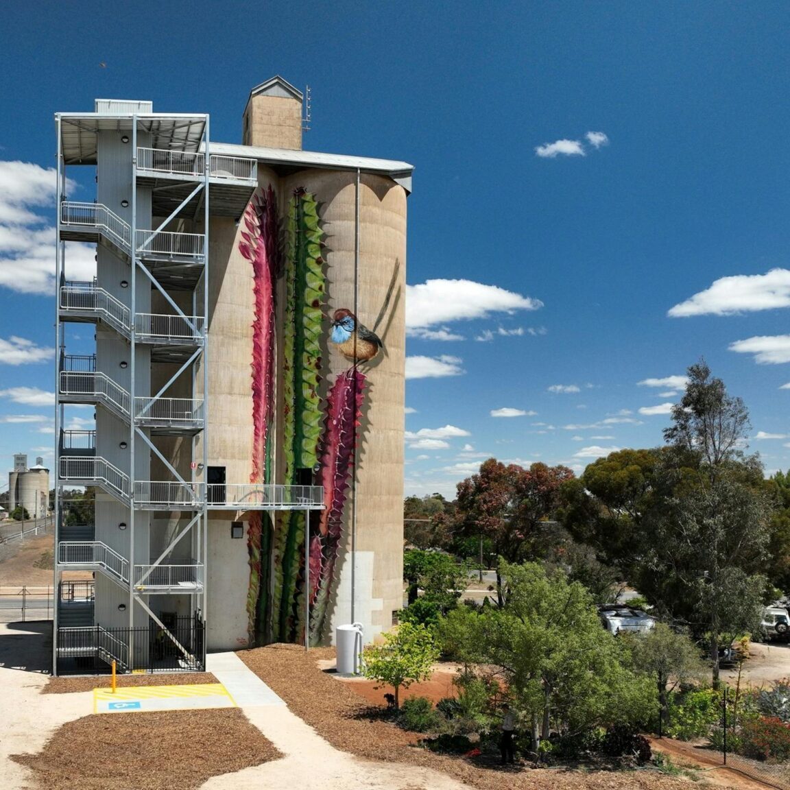 Painted silo with lookout tower alongside