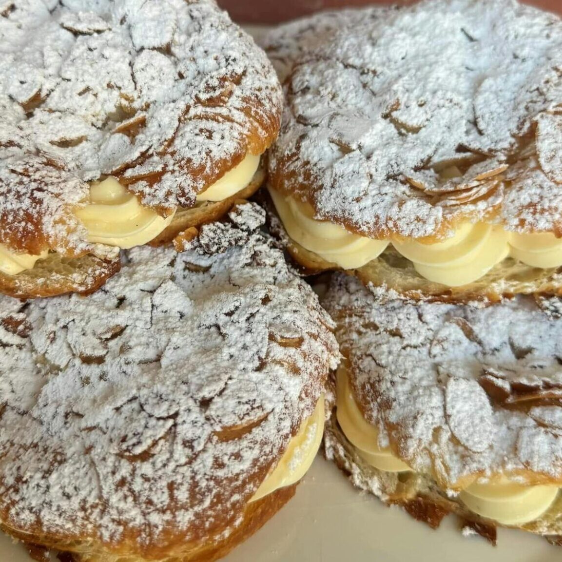 Photo of cakes full of cream known as Bee-sants