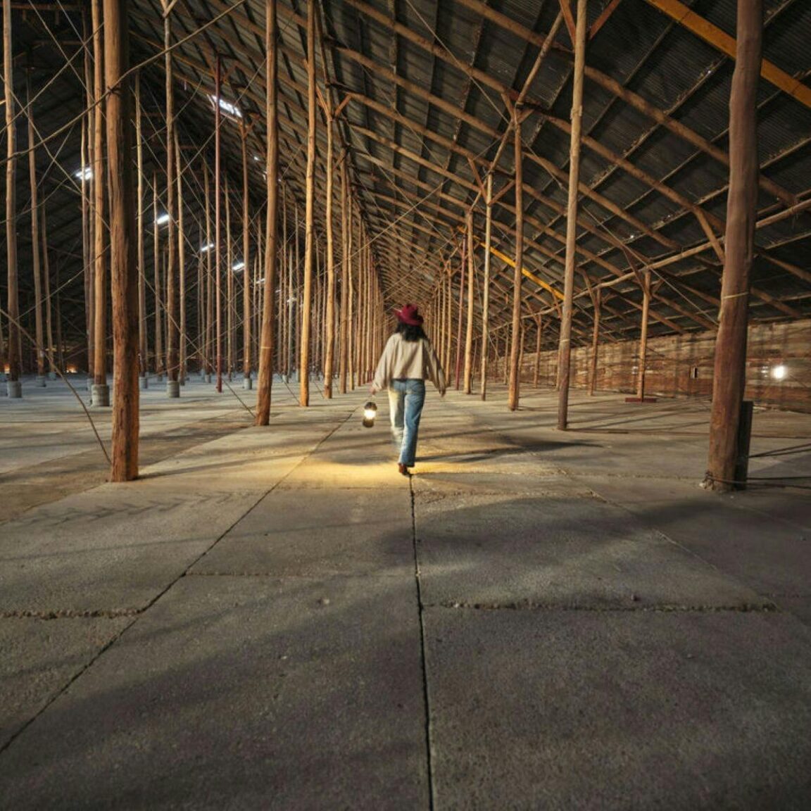 Person walking along the Stick Shed