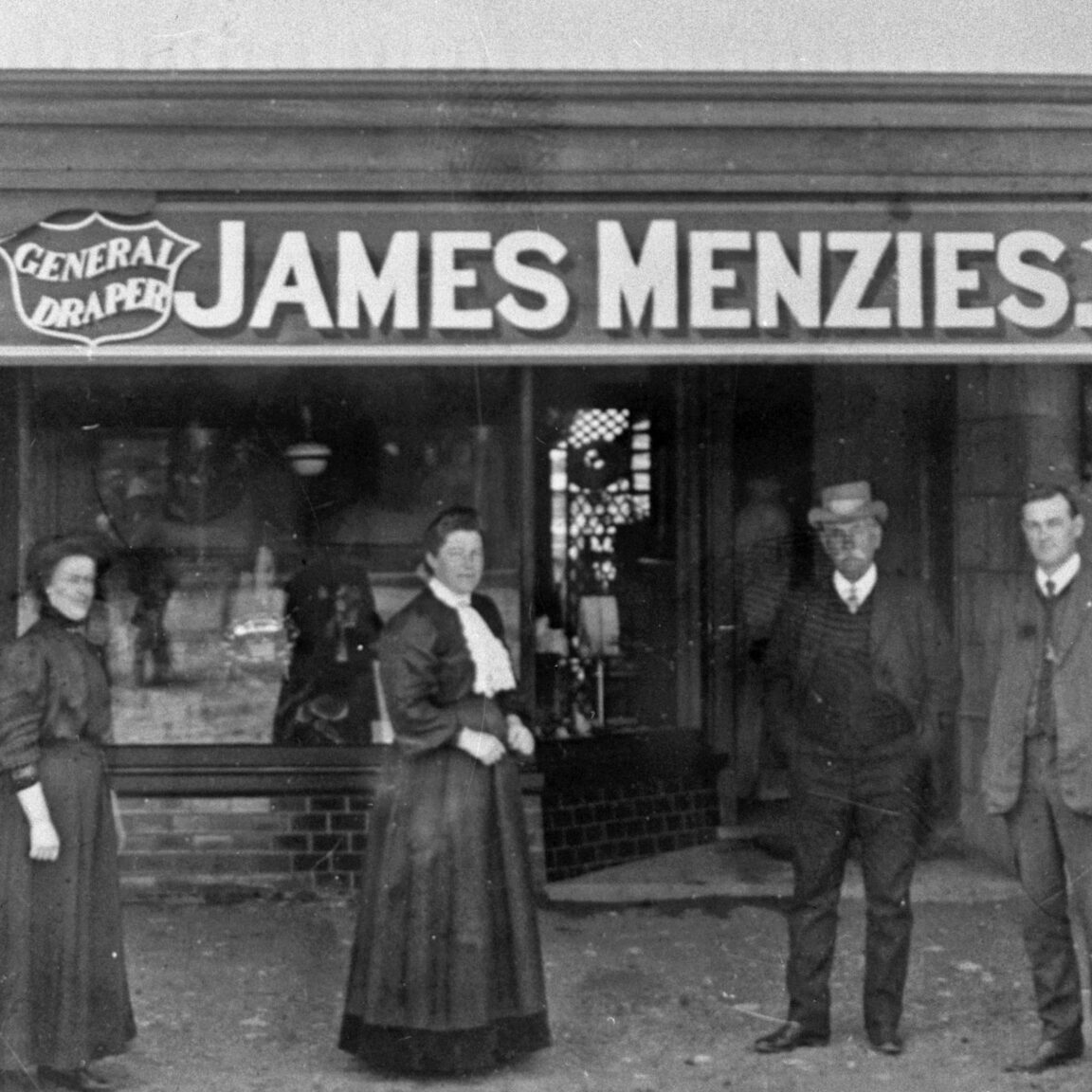 Vintage photo of James Menzies in front of Jeparit Shop