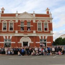 250 Dimboola locals assemble in front of the former National Bank of Australasia building.
