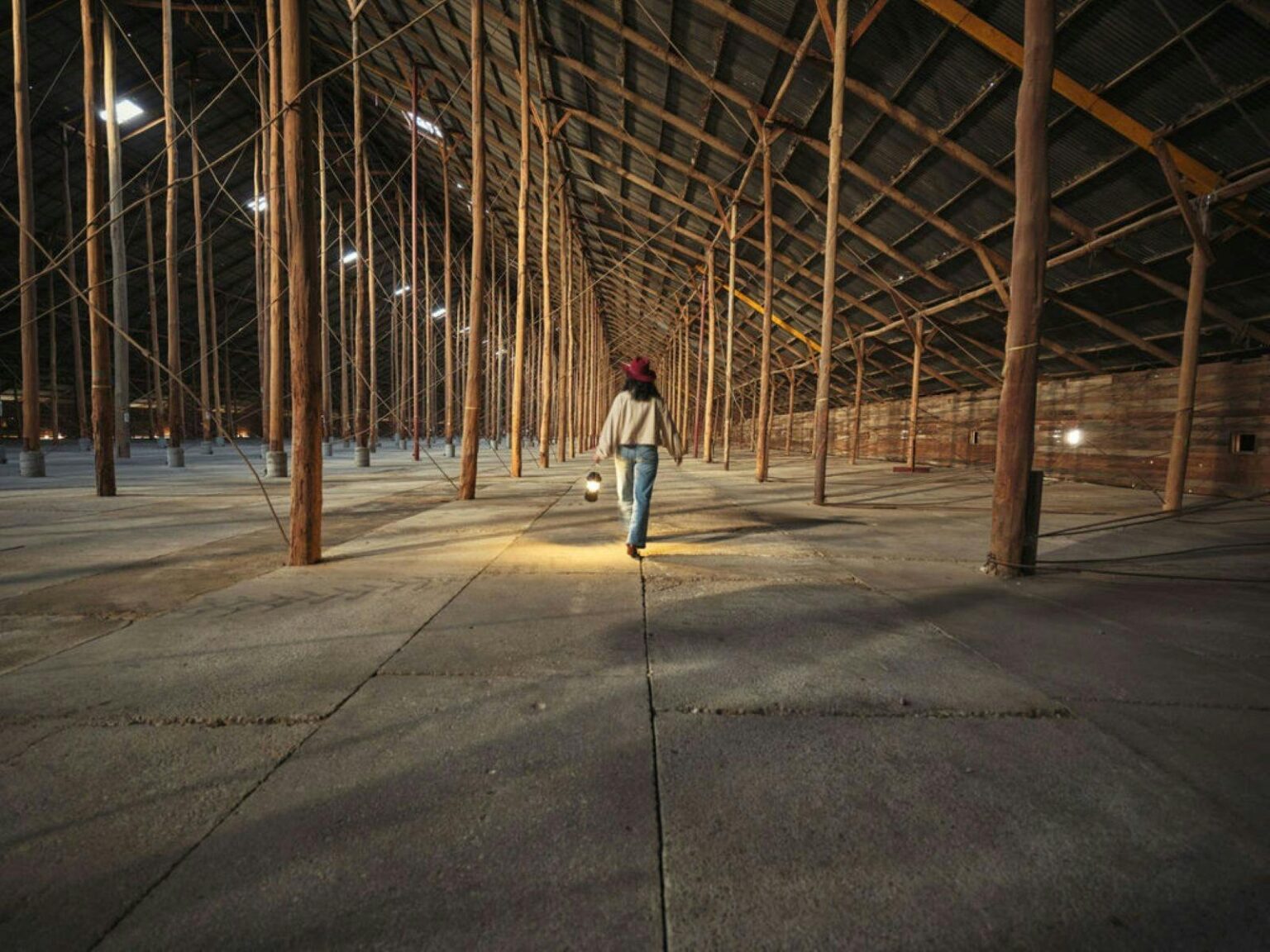 Person walking along the Stick Shed