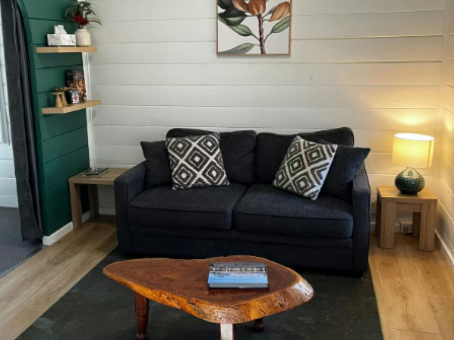 Large cosy couch and coffee table in a cabin