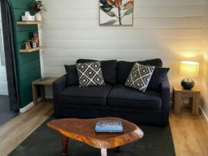 Large cosy couch and coffee table in a cabin