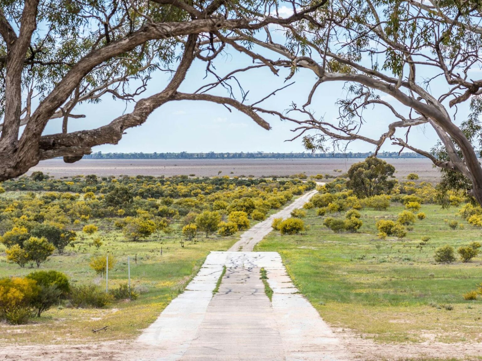 boat ramp leading out onto dry lake bed